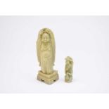 A Chinese carved jade figure of monkeys