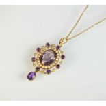 An early 20th century amethyst and seed pearl pendant on chain