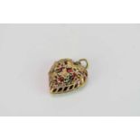 A Mughal enamelled yellow metal heart pendant