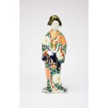 A Japanese porcelain figure of a bijin
