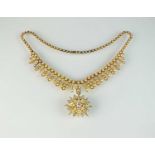A late 19th century diamond and seed pearl necklace and pendant/brooch