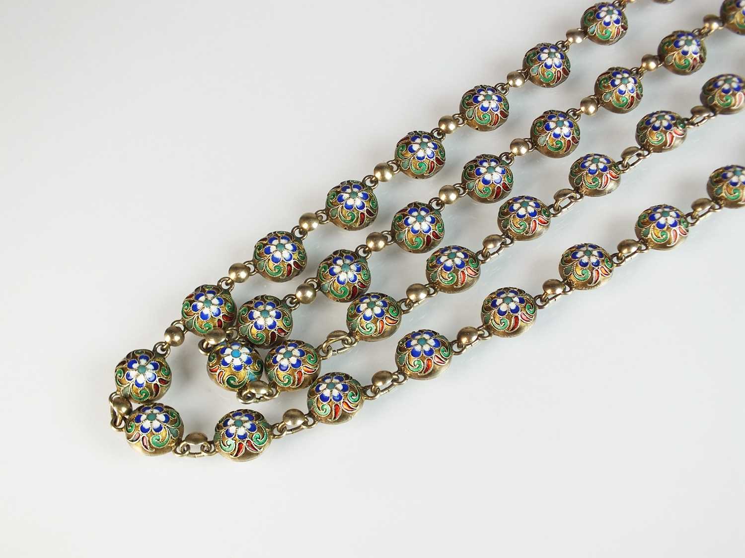 A Russian silver and enamel chain necklace