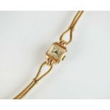 A lady's 14k gold Lathin wristwatch