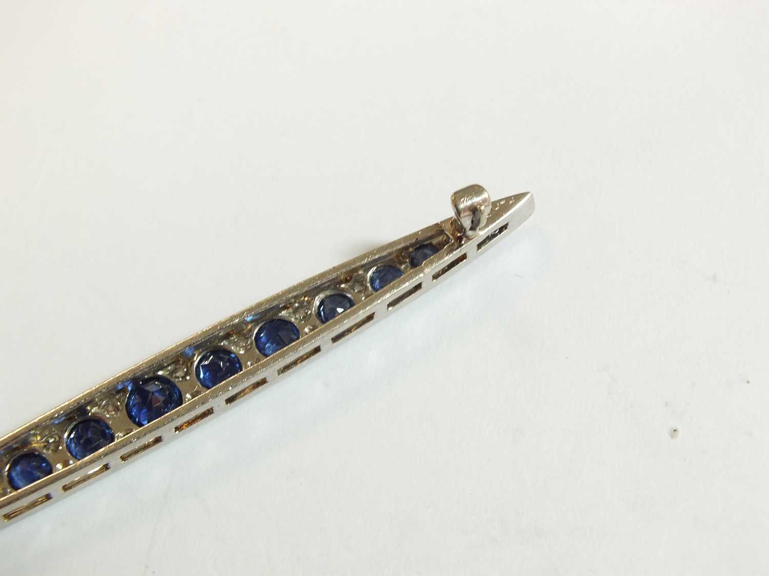 A Victorian style graduated sapphire and diamond line brooch - Image 8 of 8