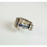 An Art Deco diamond and sapphire cocktail ring