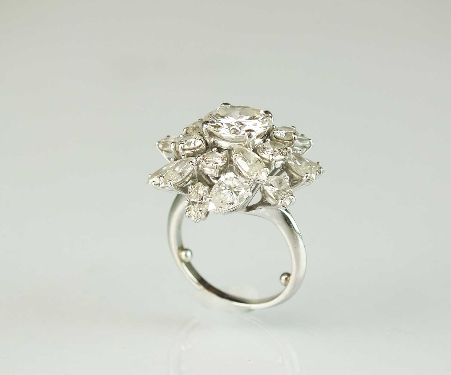 An impressive diamond cluster ring by Boucheron, designed as a central brilliant cut diamond claw - Image 4 of 13