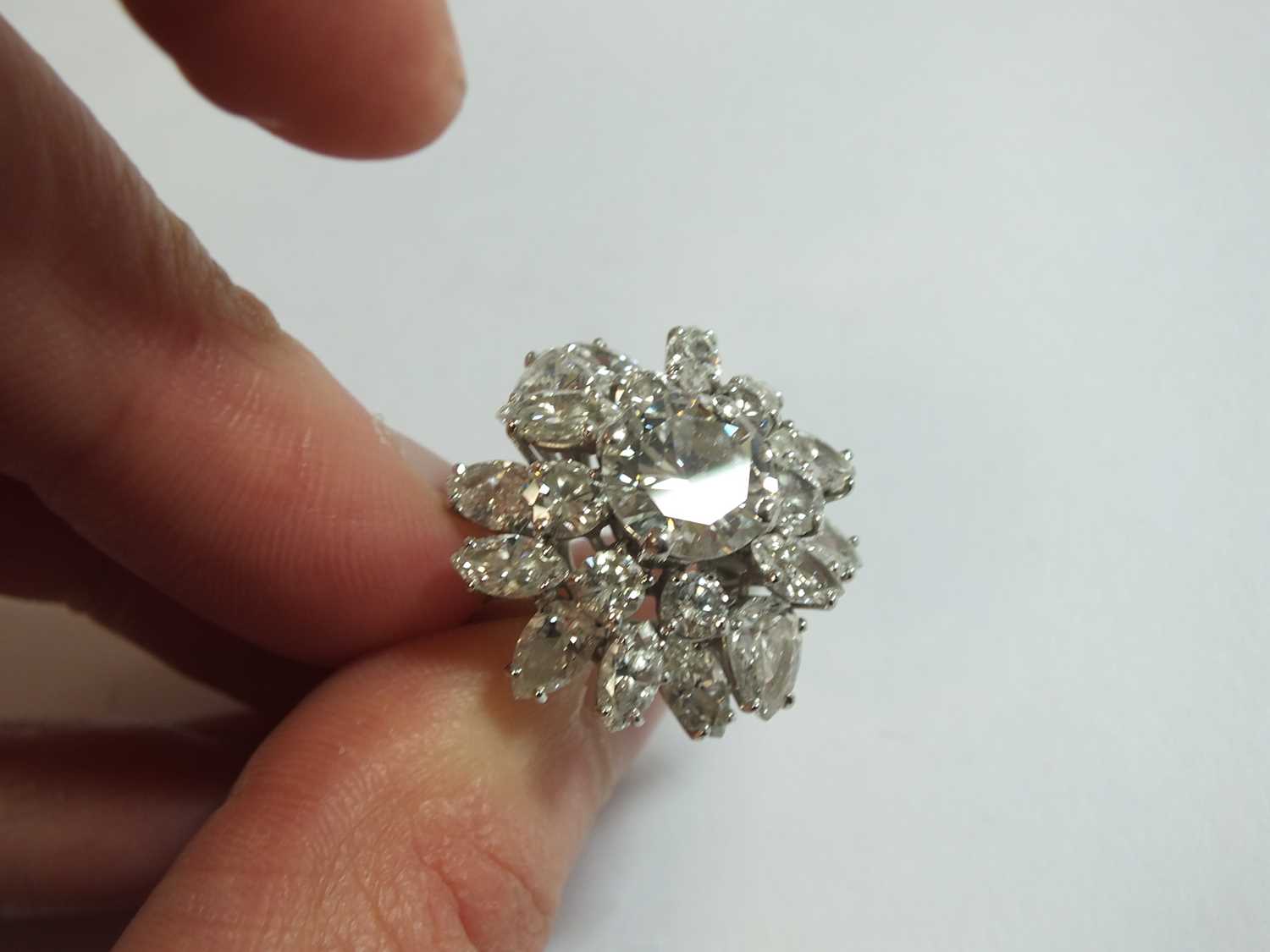 An impressive diamond cluster ring by Boucheron, designed as a central brilliant cut diamond claw - Image 12 of 13