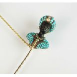 An early Victorian turquoise, pearl, diamond and garnet Blackamoor pin