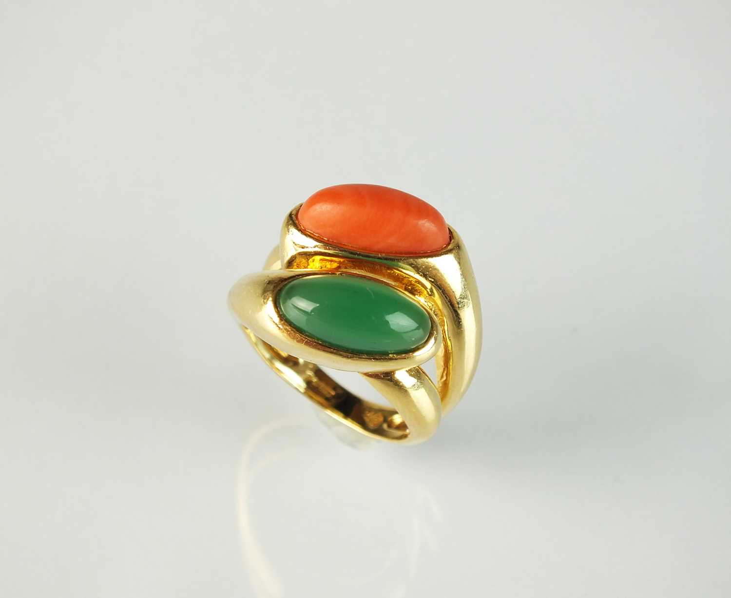 An 18ct gold coral and chrysoprase crossover dress ring by Boucheron