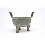 A Chinese Shang/Zhou Dynasty style bronze tripod censer
