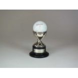 A 'hole in one' silver trophy,