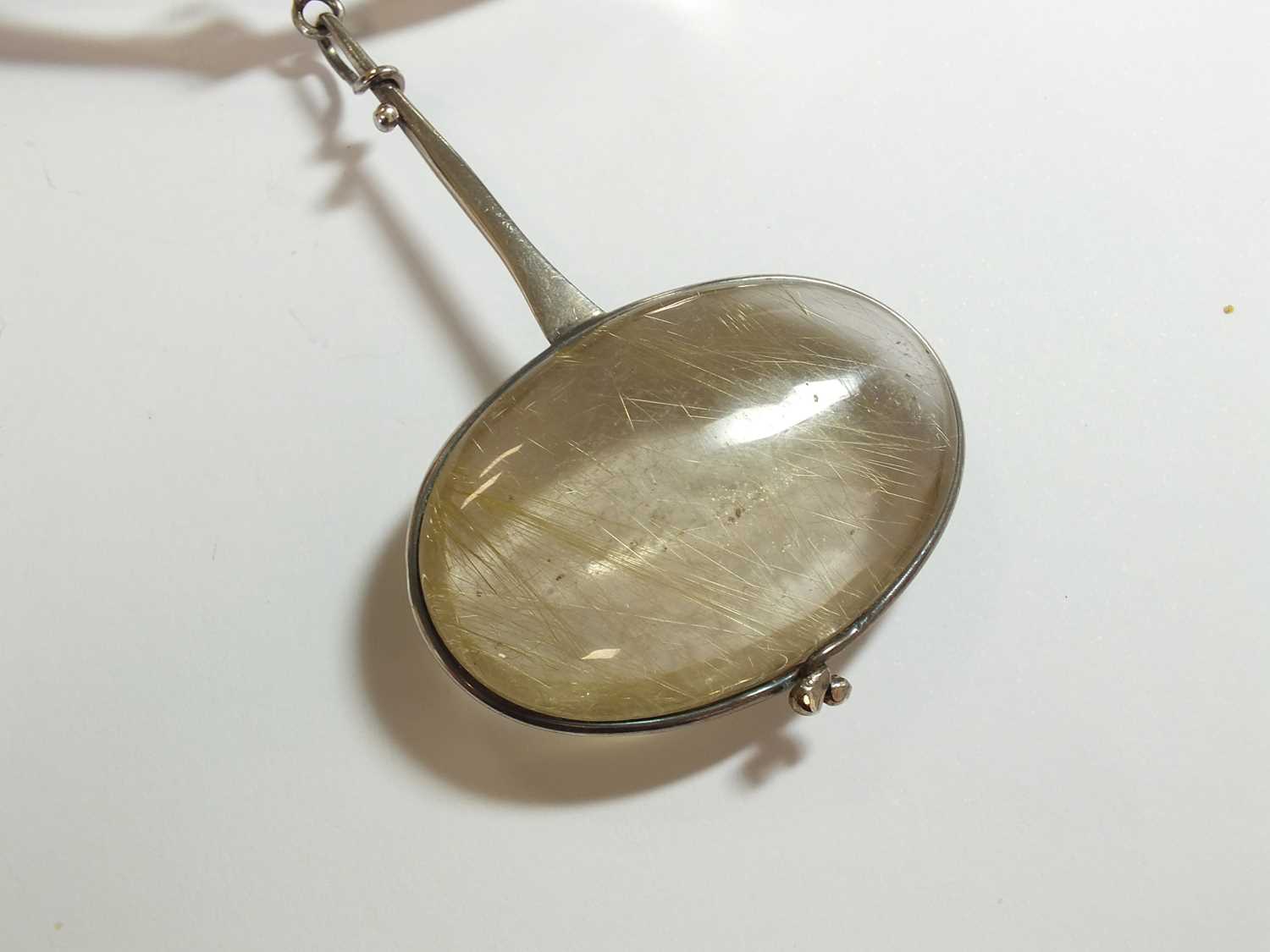 A Georg Jensen silver neck ring and rutilated quartz pendant designed by Vivianna Torun Bulow-Hube - Image 2 of 11