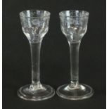 A near pair of 18th-century wine glasses
