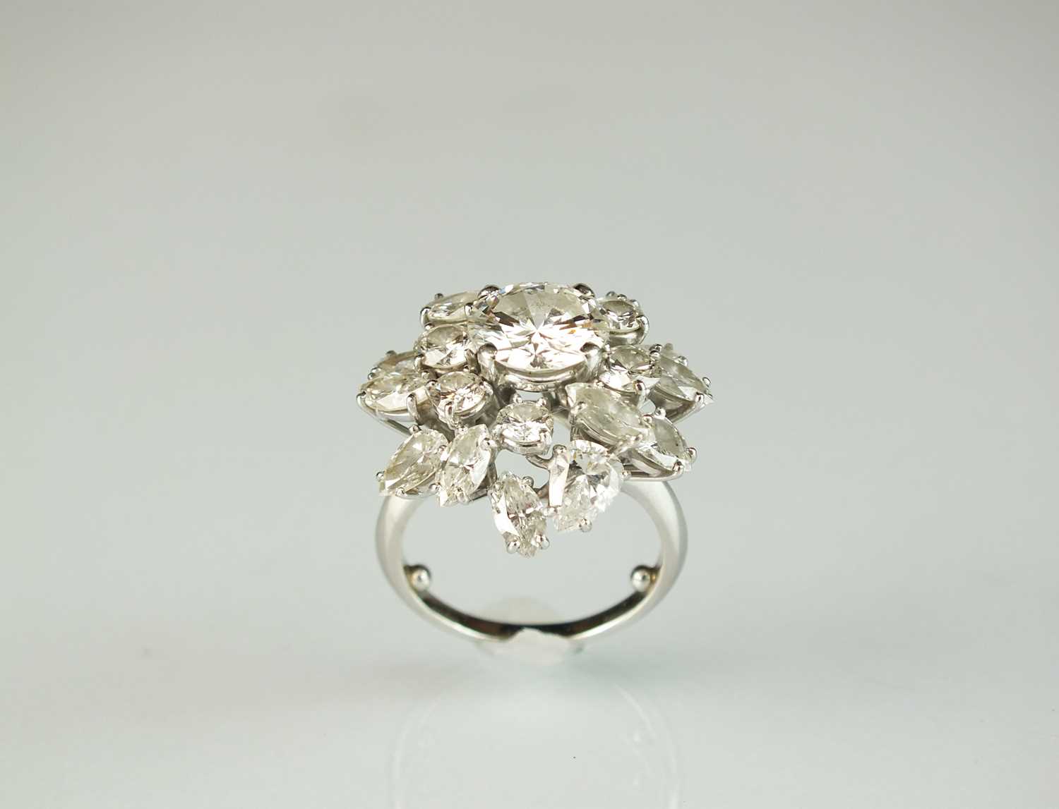 An impressive diamond cluster ring by Boucheron, designed as a central brilliant cut diamond claw - Image 5 of 13