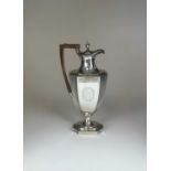 A George III silver hot water jug