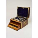 A Victorian brass-inlaid rosewood dressing case with silver fittings