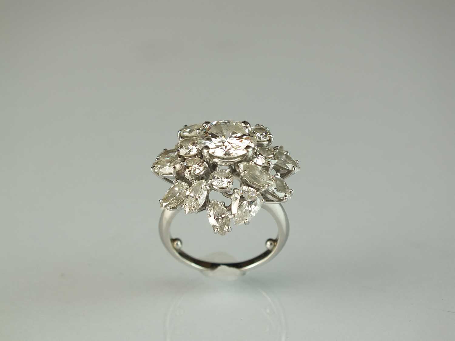 An impressive diamond cluster ring by Boucheron, designed as a central brilliant cut diamond claw - Image 6 of 13