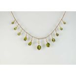 A peridot and seed pearl fringe necklace