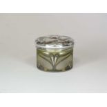 An Art Nouveau silver topped glass dressing table jar