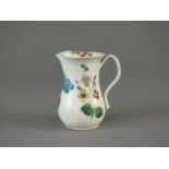 A Staffordshire saltglaze enamelled cream jug, circa 1760