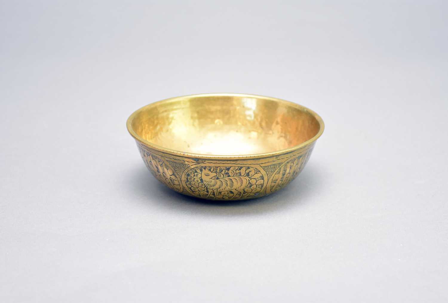 A Qajar brass Fars bowl with a Thuluth inscription