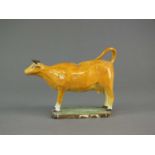 An English pearlware cow creamer, early 19th century
