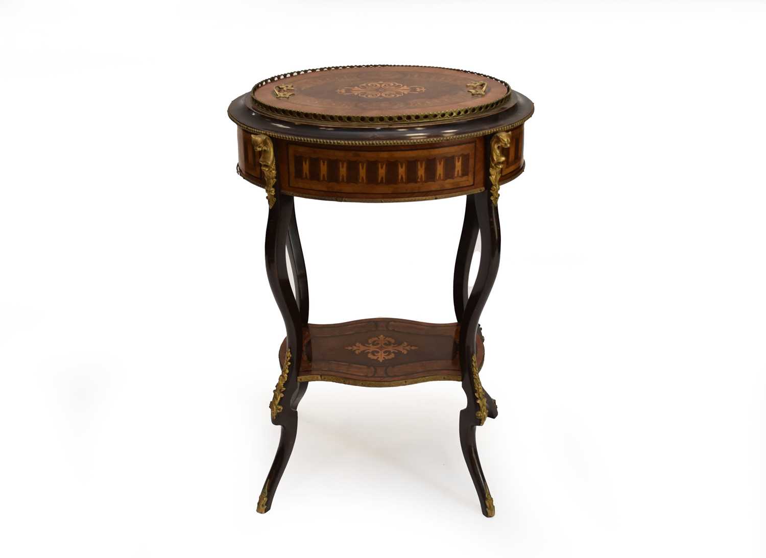A 19th century French, brass mounted, boxwood and sycamore marquetry veneered, oval jardiniere