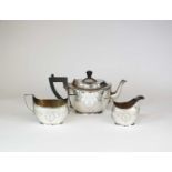 An early 20th century three piece silver tea service