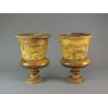 A pair of Buckley slipware flower pots