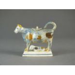 A Staffordshire prattware cow creamer