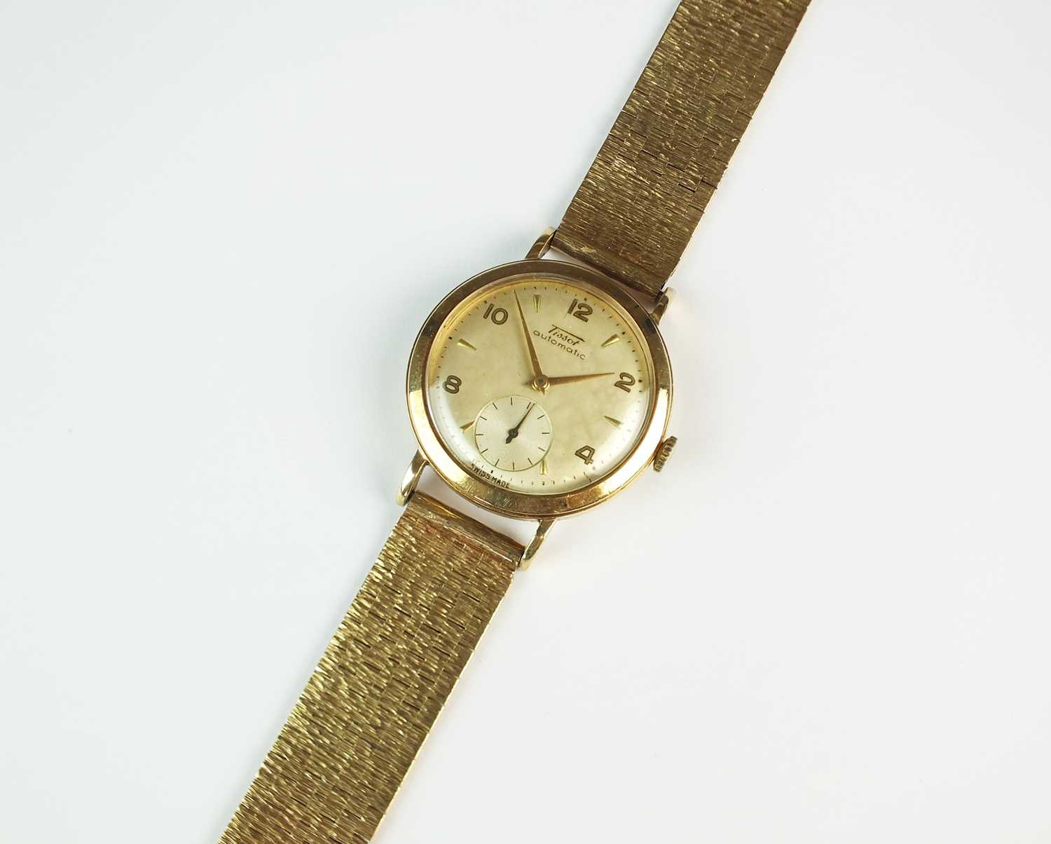 A Gentleman's 9ct gold Tissot automatic wristwatch