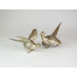 A pair of Garrard's silver table ornaments in the form of pheasants