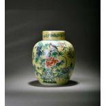A Chinese yellow-ground famille verte vase