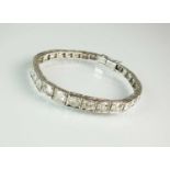 A graduated diamond line bracelet