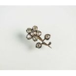 An old cut diamond flower brooch