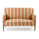 An 20th century upholstered sofa