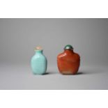 Two Chinese snuff bottles, chalcedony and glass