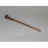 An unusual Chinese ivory-inlaid rootwood swagger stick