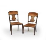 A pair of Edwardian inlaid mahogany side chairs