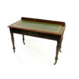 A late Victorian/Edwardian mahogany writing table