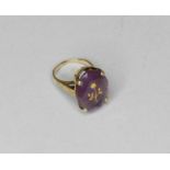 A amethyst set dress ring