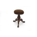 A Victorian mahogany adjustable piano stool