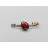 An enamelled yellow metal ladybird bar brooch