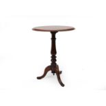 A late Victorian mahogany oval tripod occasional table