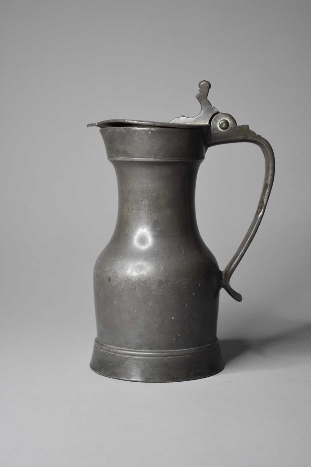 A French pewter tappit hen or 'pichet a epaulement', dated 1736