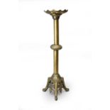 A large brass ecclesiastical style candlestick