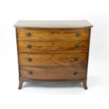 An early-mid 19th century pale mahogany veneered chest of drawers