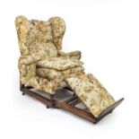 A Victorian Foot & Son patent upholstered reclining reading chair