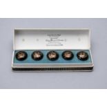 A set of five boxed South East Asian niello style buttons