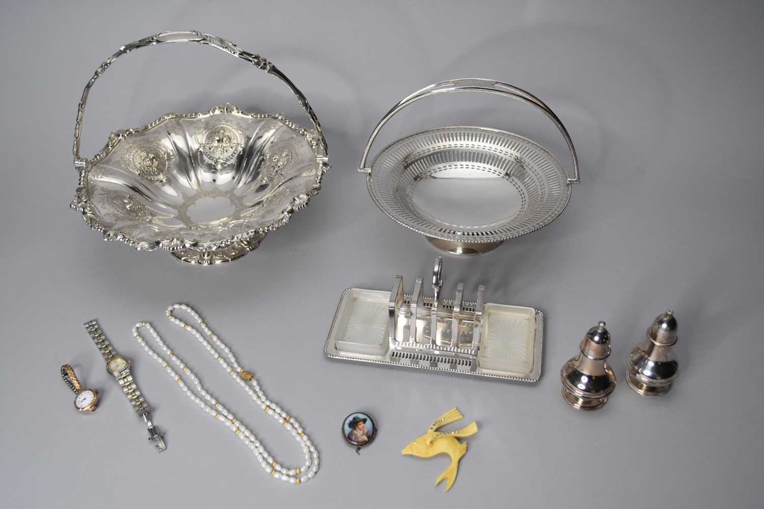 A small collection of jewellery and silver plated wares